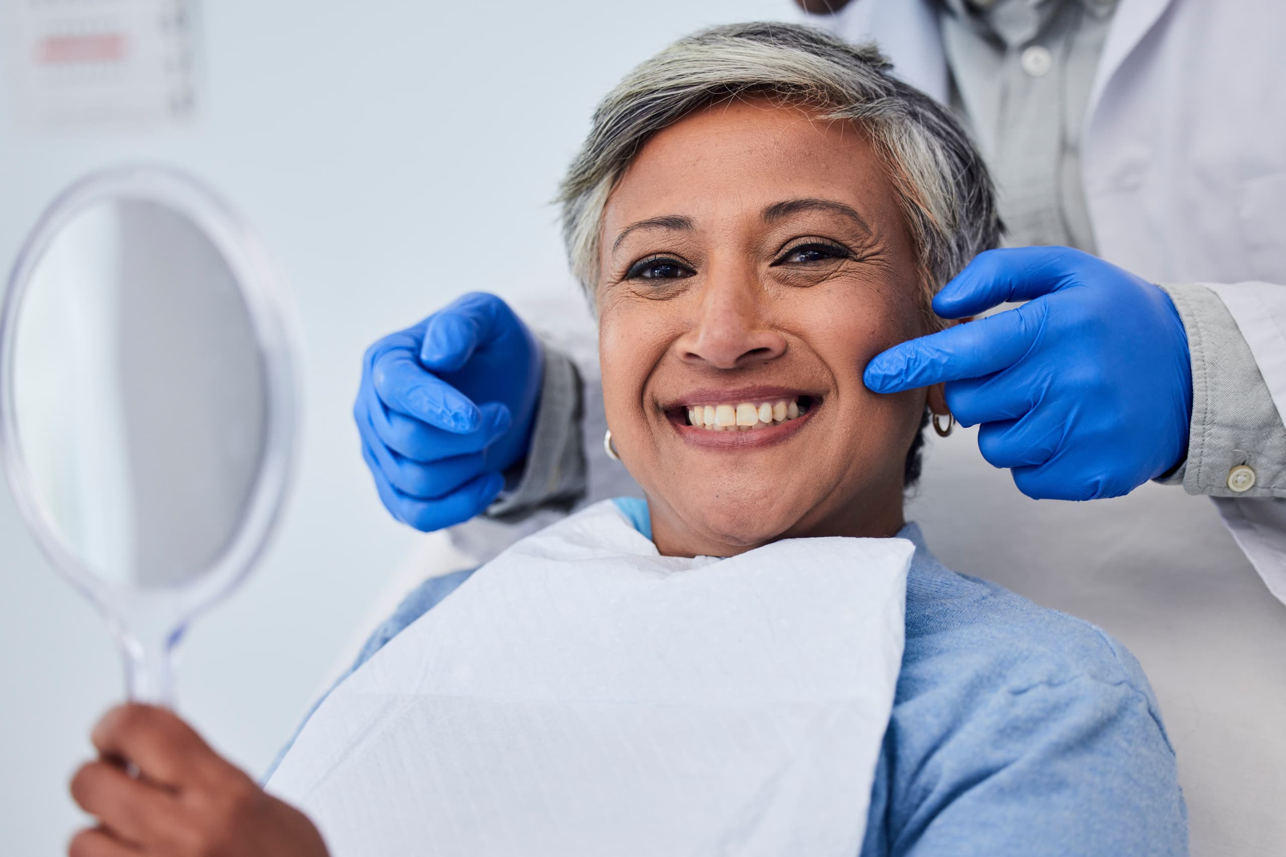 woman smiling after dental whitening