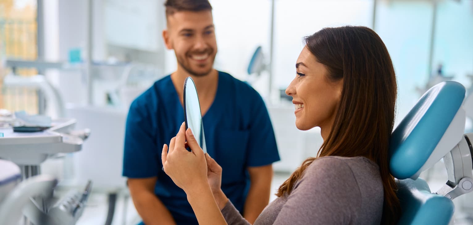 private dentist talking to patient