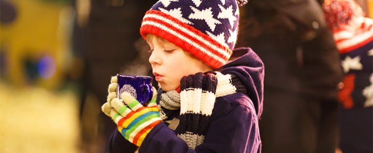  child with hot chocolate