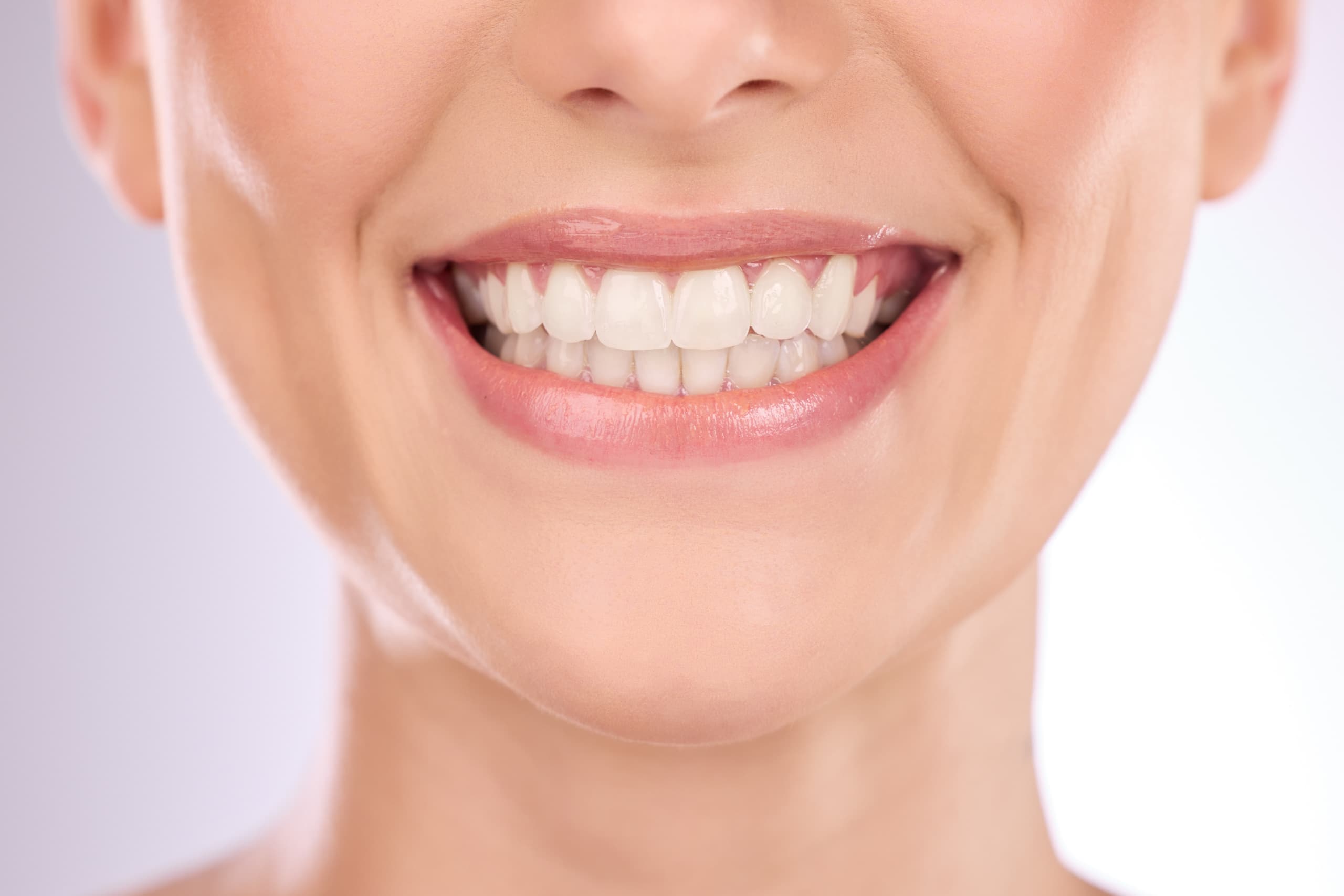 Woman with healthy teeth smiling