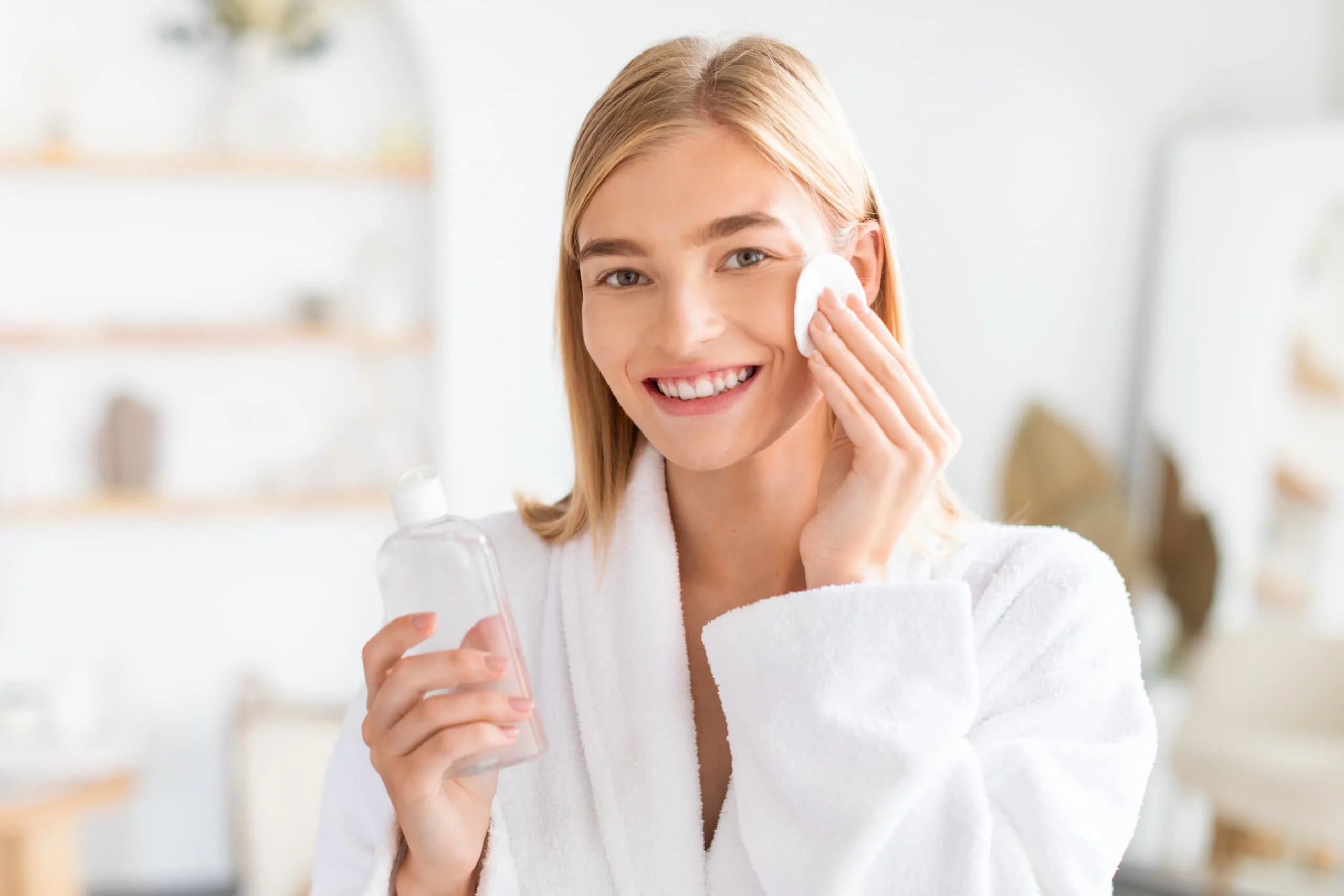 Woman applying skincare