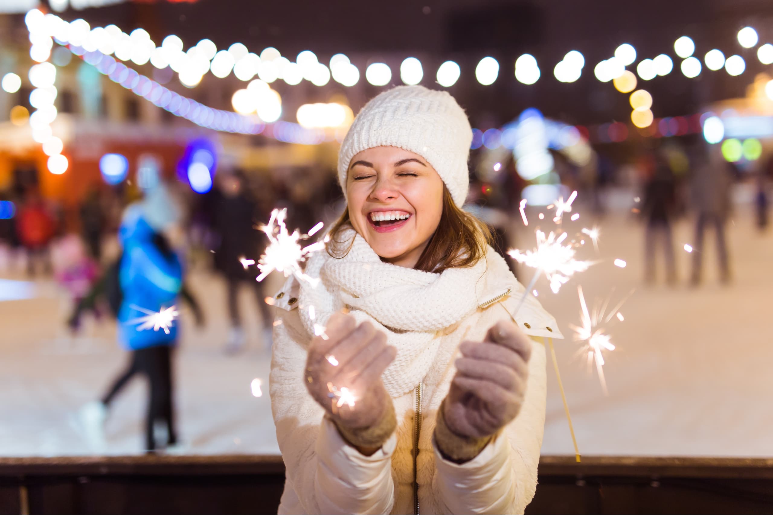 girl with white healthy smile in new years outdoor event