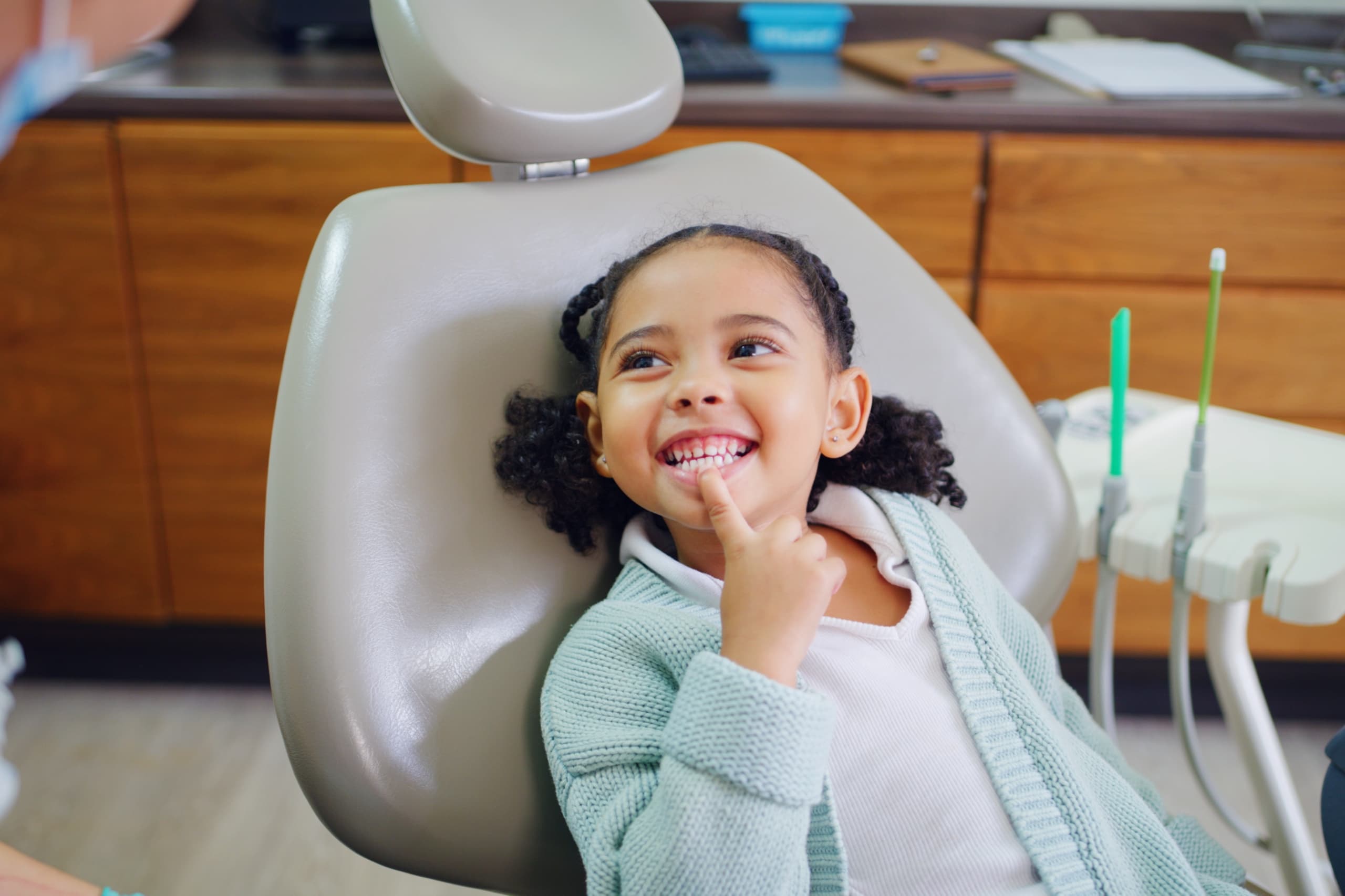 child smiling at the dentist