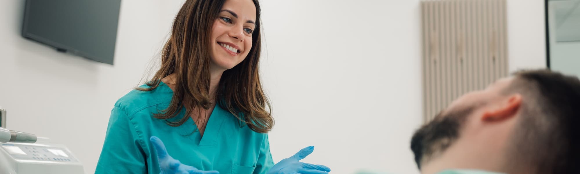dentist and patient discussing treatments