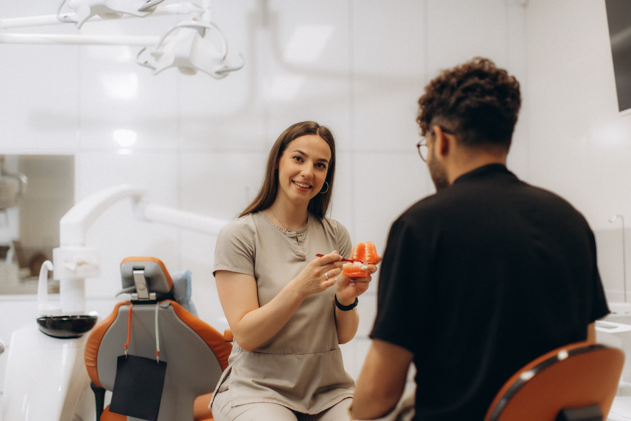 dentist talking to patient
