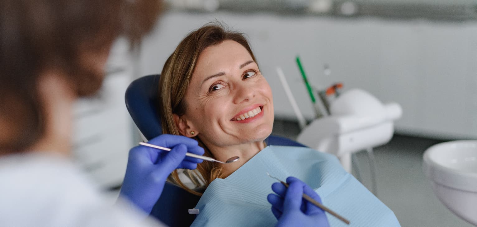patient smiling at dentist