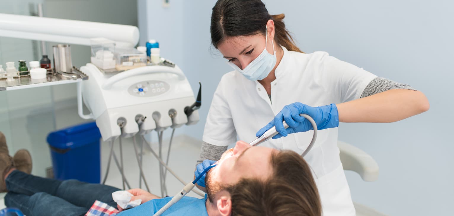 dentists examining patient